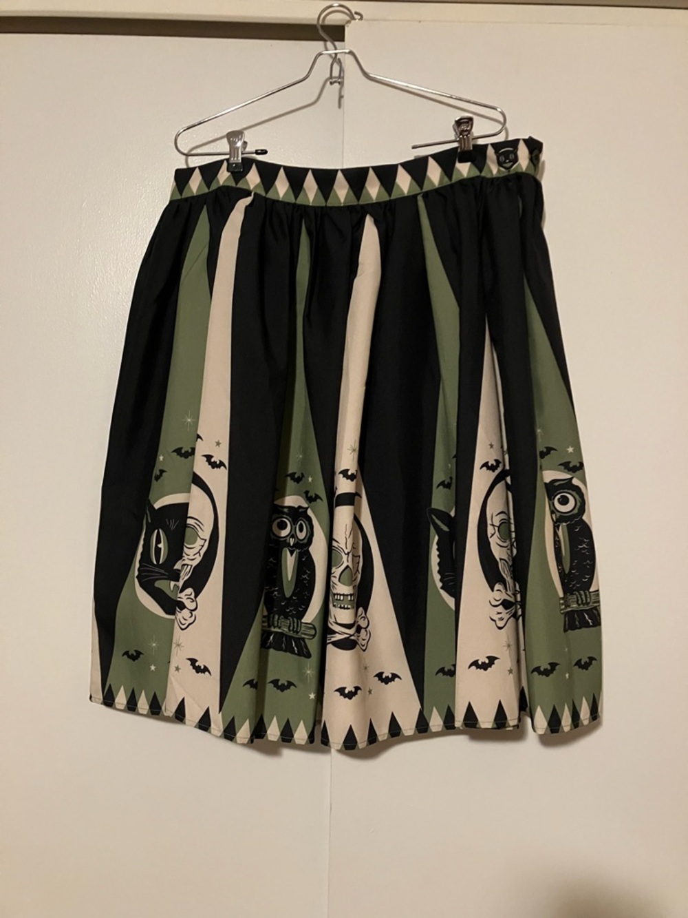 The Oblong Box Shop Halloween skirt in green and black with cats owls skulls